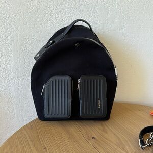 Rimowa black backpack